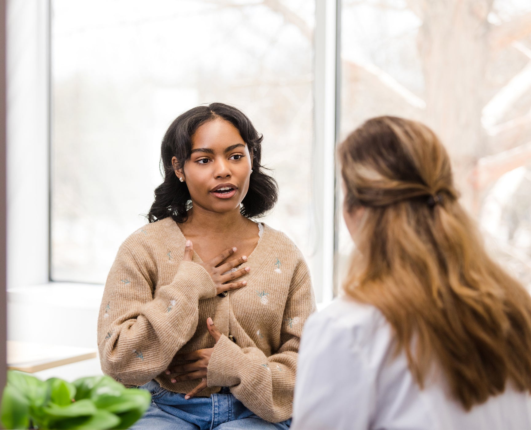 woman chatting with another woman